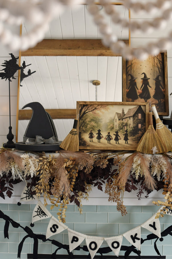 Three Witches with pumpkins in Forest