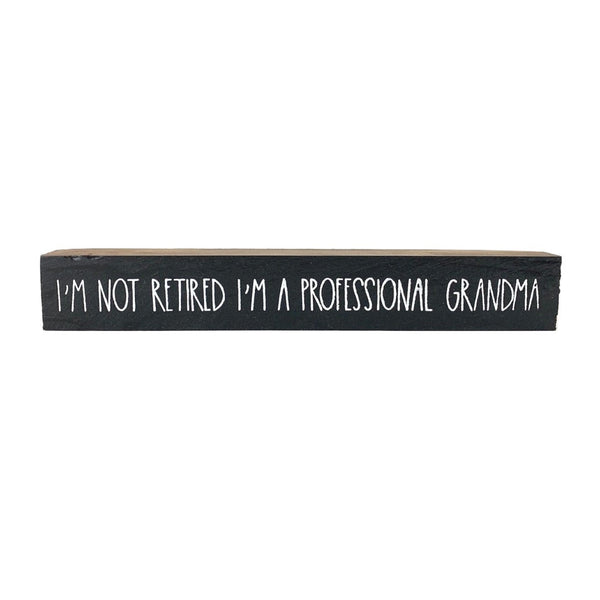 I'm Not Retired I'm A Professional Grandma <br>Shelf Saying